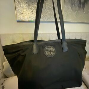 Tory Burch authentic E/W Black Tote Nylon Bag with leather straps and logo.